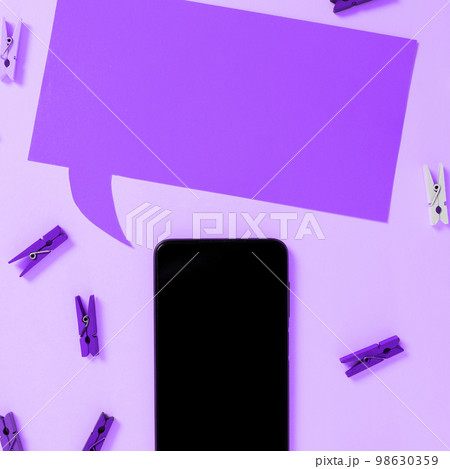 Important Message Presented On Phone On Desk With lothespins, Paper. Crutial Information Shown On Cellphone Screen Placed On Table. New Ideas On Mobile Phone. 98630359