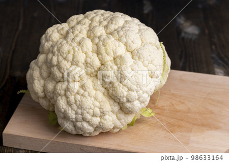 Cauliflower close up during cooking, fresh raw cauliflower 98633164