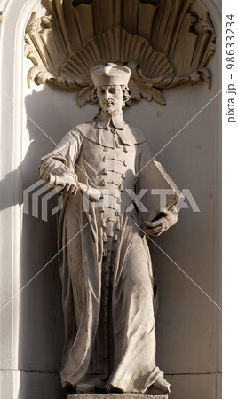Saint John Sarkander on the portal of Parish Church of the Holy Blood in Graz, Styria, Austria Saint John Sarkander on the portal of Parish Church of the Holy Blood in Graz, Styria, Austria 98633234