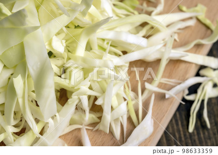 Sliced white cabbage on the table Sliced white cabbage on the table 98633359