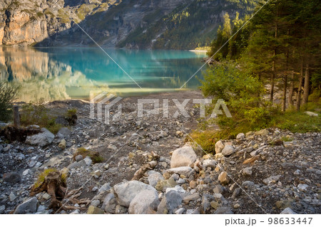 Oeschinensee lake in Switzerland Oeschinensee lake in Switzerland 98633447