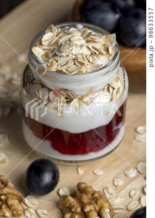 Fresh delicious yogurt made from milk with walnuts Fresh delicious yogurt made from milk with walnuts 98633557