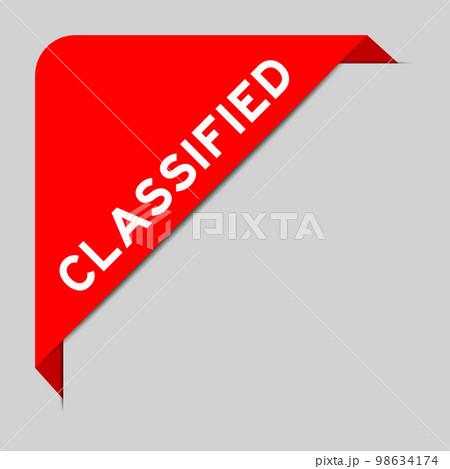 Red color of corner label banner with word classified on gray background 98634174