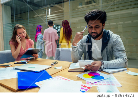 multiracial business group working at modern office 98634873