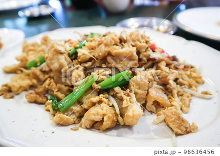 stir fried noodles with pork and vegetable or stir fried tofu stir fried noodles with pork and vegetable or stir fried tofu 98636456