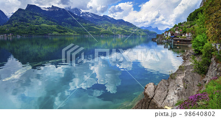 Beautiful scenic lakes of Switzerland - Walensee ,tranquil typical small village Quinten. Beautiful scenic lakes of Switzerland - Walensee ,tranquil typical small village Quinten. 98640802