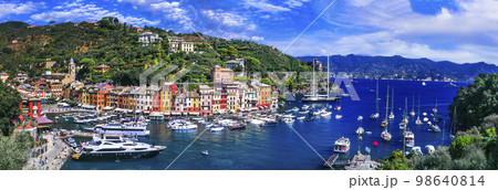 Portofino  -Luxury resort and beautiful colorful village in Liguria. Panoramic view with colorful houses and sail boats. Italy travel 98640814