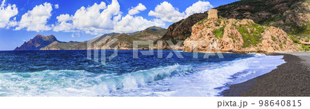 Corsica island beaches and nature scenery. Tower of Portu - historic Genoese tower and beach in village Ota in west of the island. France 98640815