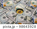 Compass on US dollar banknotes background.  investment, financial crisis 98643928