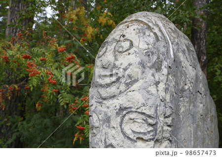 Replica of Menhir, ancient stone monument to serve ceremonial and religious events in Siberia 98657473