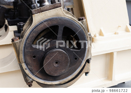 Mechanic parts of an old boat engine, close up photo Mechanic parts of an old boat engine, close up photo 98661722