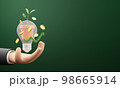 Green economy concept design of business hand with light bulb and tree in flower pot with gold coin 3D render 98665914
