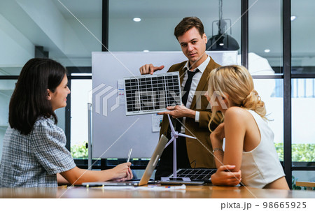 Business person meeting on solar cell panel technology. Business person meeting on solar cell panel technology. 98665925