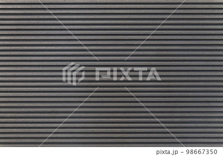 Dark striped wooden wall. Interior element Dark striped wooden wall. Interior element 98667350