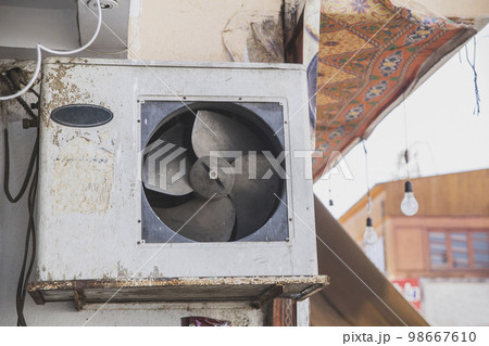 broken dirty air conditioner on the home in Africa broken dirty air conditioner on the home in Africa 98667610
