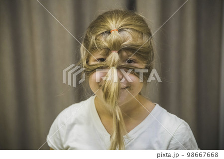 girl for fun made from hair a mask on her face girl for fun made from hair a mask on her face 98667668