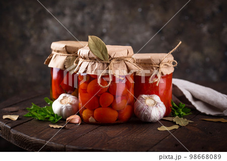 Pickled vegetables in glass jars. Pickled vegetables in glass jars. 98668089