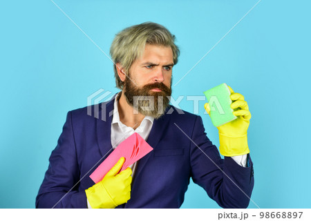use sponge and detergent for floor cleaning. clear business. housekeeping and cleaning concept. House cleaning. bearded man doing housework and cleaning. handsome businessman with washing gloves use sponge and detergent for floor cleaning. clear business. housekeeping and cleaning concept. House cleaning. bearded man doing housework and cleaning. handsome businessman with washing gloves 98668897