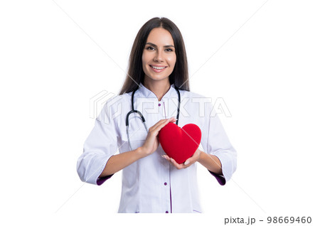 happy cardiologist with heart isolated on white. cardiologist show heart donation in studio. 98669460