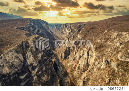 Morning dawn Lazarev Canyon fiery sky with clouds 98672284