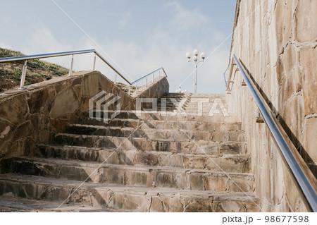 Stairs in the city park with blue sky Stairs in the city park with blue sky 98677598
