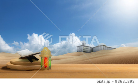 Quran open on a wooden placemat with an Arabic lamp on a wooden table Quran open on a wooden placemat with an Arabic lamp on a wooden table 98681895