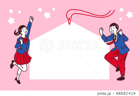 受験に合格して喜んでガッツポーズする制服の学生 98682419