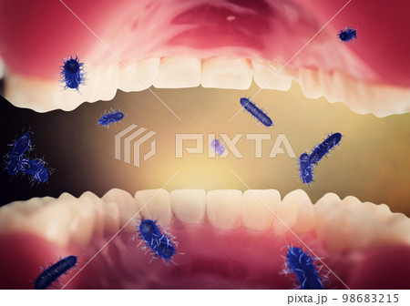 Opened mouth full of viruses and bacteria 98683215