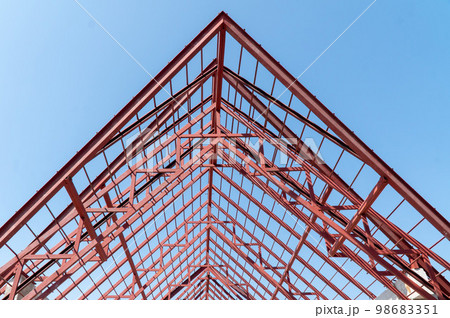 steel frames and trusses of a industrial building. steel frame building project scheme. 98683351