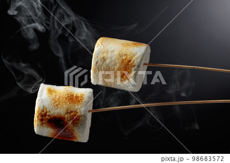 Toasted marshmallows with smoke. Toasted marshmallows with smoke. 98683572