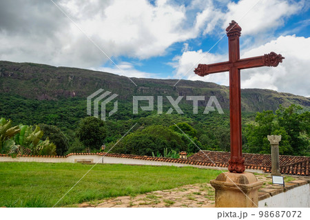 christian cross overlooking the city of Tiradentes, in Minas Gerais, Brazil christian cross overlooking the city of Tiradentes, in Minas Gerais, Brazil 98687072