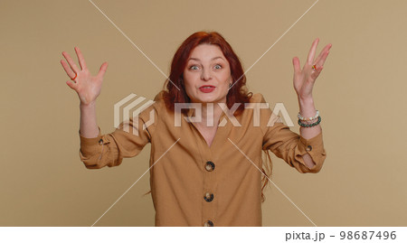 Excited amazed woman showing head explosion, looking worried shocked surprised girl, wow idea eureka Excited amazed woman showing head explosion, looking worried shocked surprised girl, wow idea eureka 98687496