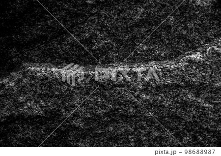 Rock texture. The surface of the stone is like a wall. White gray grunge background with copy space for design. 98688987