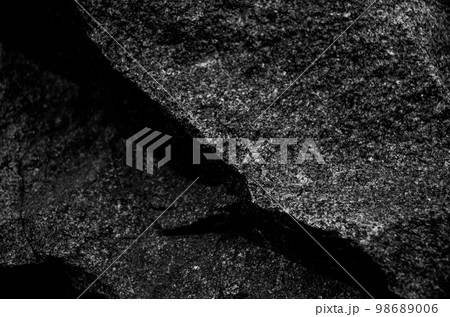 Rock texture. The surface of the stone is like a wall. White gray grunge background with copy space for design. 98689006