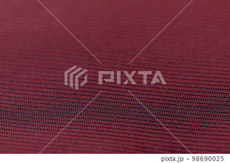 Close up of red silk 98690025