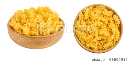 Pasta cornetti creste macaroni in wooden bowl isolated on white background with full depth of field 98692912