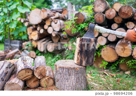 Photography on theme big steel axe with wooden handle 98694206