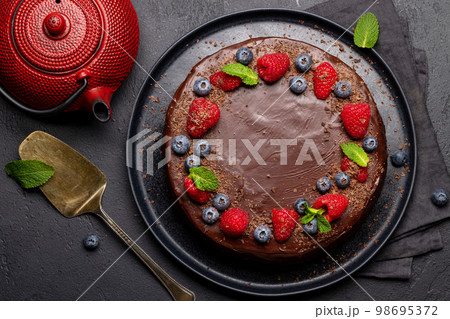 Chocolate cake dessert with fresh berries 98695372