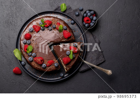 Chocolate cake dessert with fresh berries 98695373