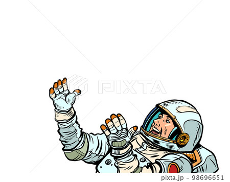male astronaut, hands raised up. Science and space exploration. Man in a spacesuit 98696651