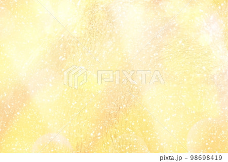 金色の質感のあるキラキラ光の背景 ゴールド 98698419