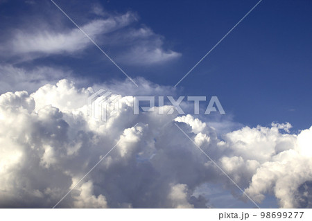 white clouds with sunlight on blue sky background 98699277