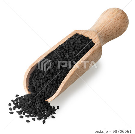 black cumin seeds in scoop isolated on white 98706061