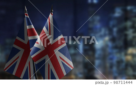 Small flags of the United Kingdom on an abstract blurry background 98711444