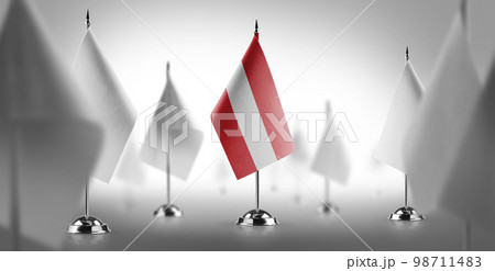 The national flag of the Austria surrounded by white flags 98711483
