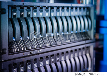 Row of hard disks used for data storage in internet data center 98712666