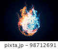 燃え上がる火の玉と黒背景 98712691