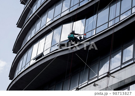 Window Washers on a Office Building. 98713827