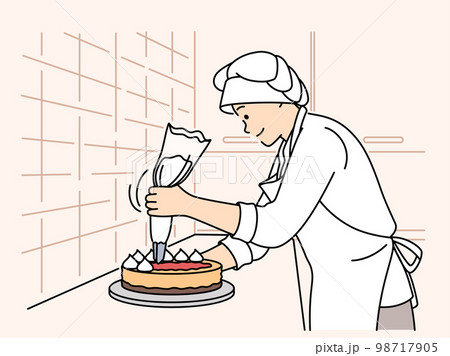 Female chef decorating cake at restaurant Female chef decorating cake at restaurant 98717905