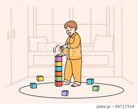 Cute child play with building blocks  98717916